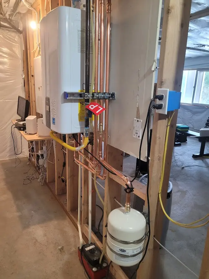 Licensed plumber repairing a kitchen sink in Tallulah